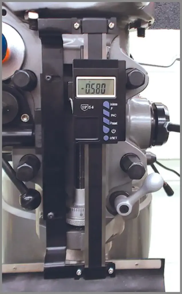 iGaging IP54 Digital Quill Kit mounted on a Bridgeport-type milling machine showing LCD readout and scale