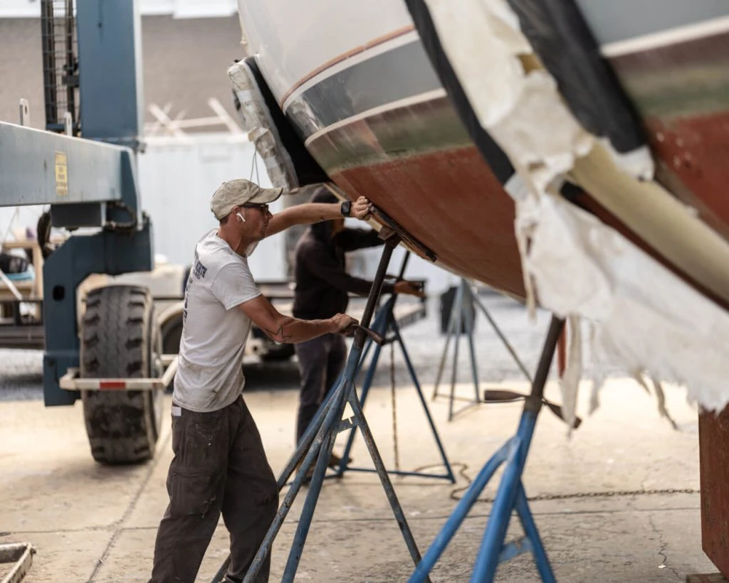 Employee working on a boat