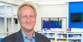 headshot of Jim Husar