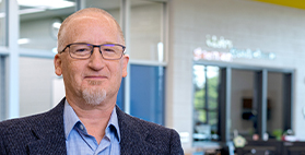 Headshot of Kyle Hewson