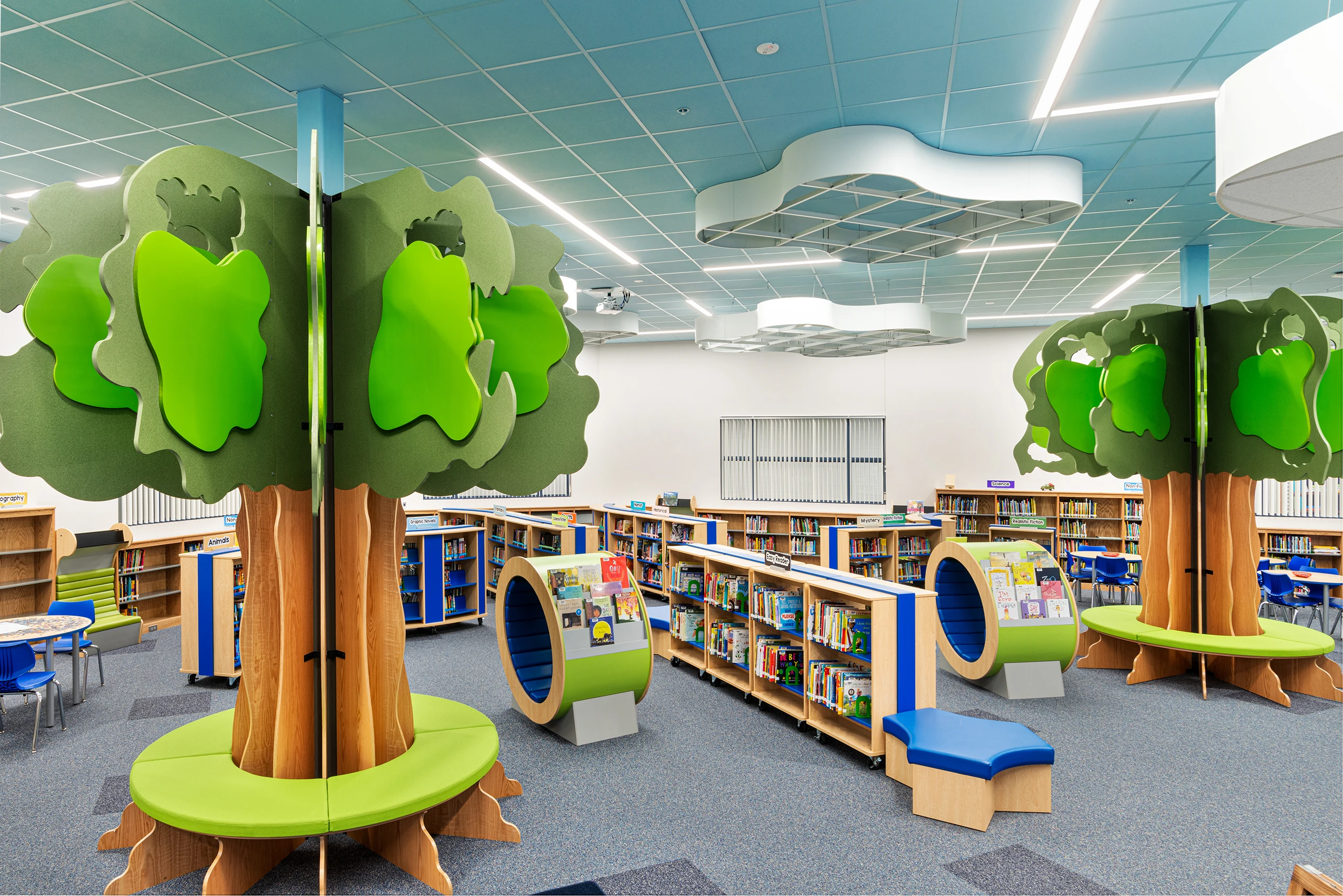 Aspen Meadow Elementary School's Media Center Featuring Furniture Shaped as Trees