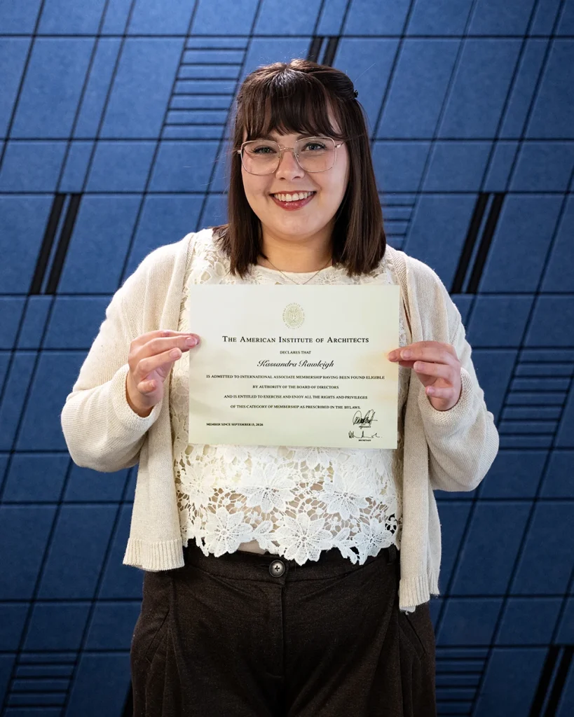 Kassandra Rawleigh holding AIA Certificate