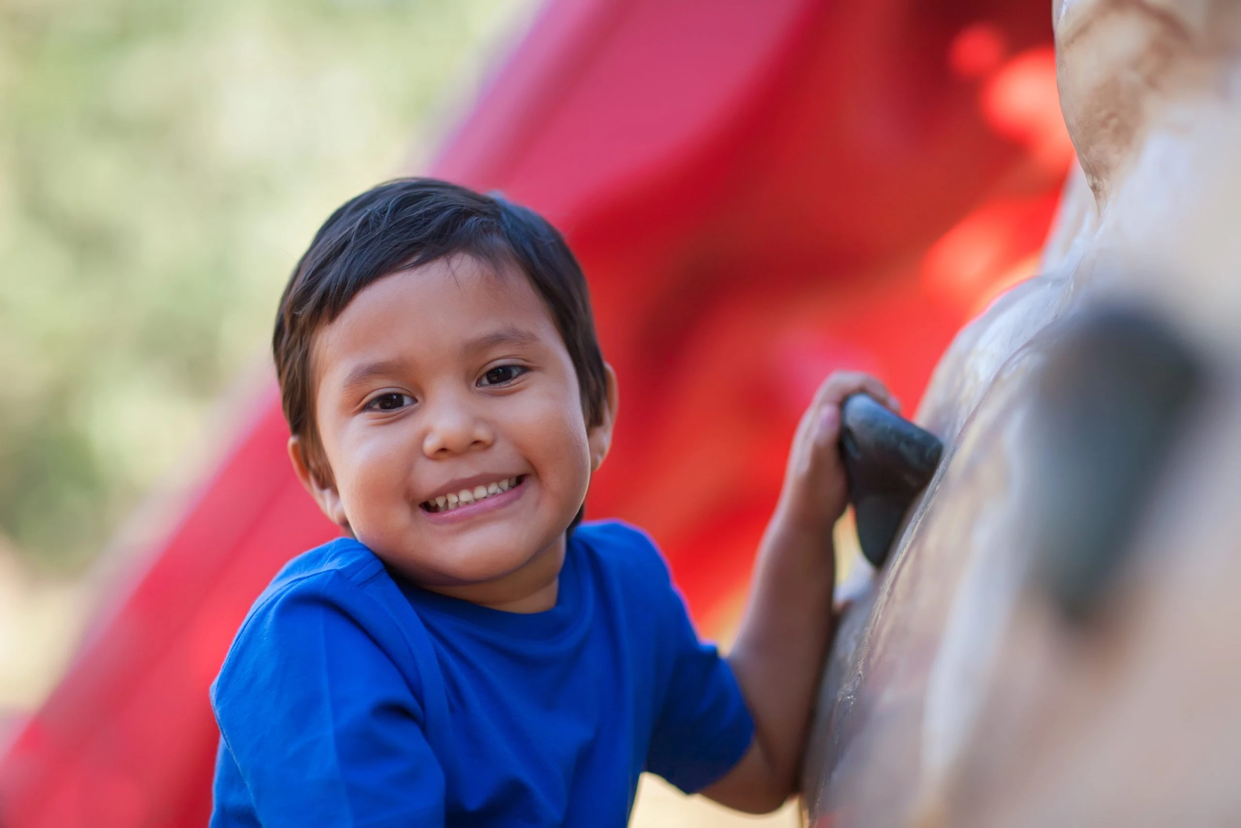 Smiling Child Climbing
