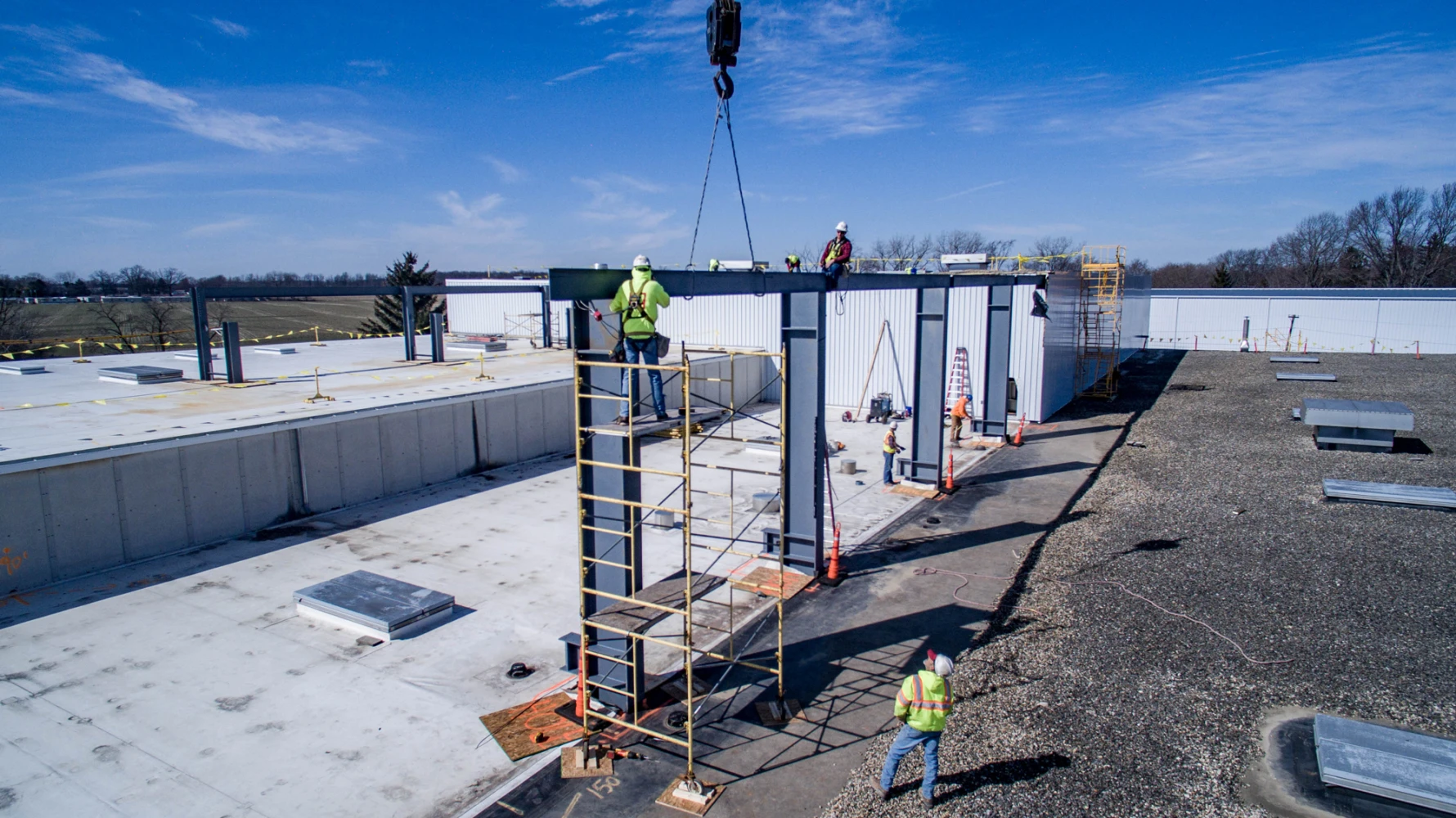 Aerial view of Almco Steel Products building during frame construction