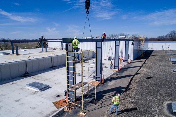 Aerial view of Almco Steel Products building during frame construction