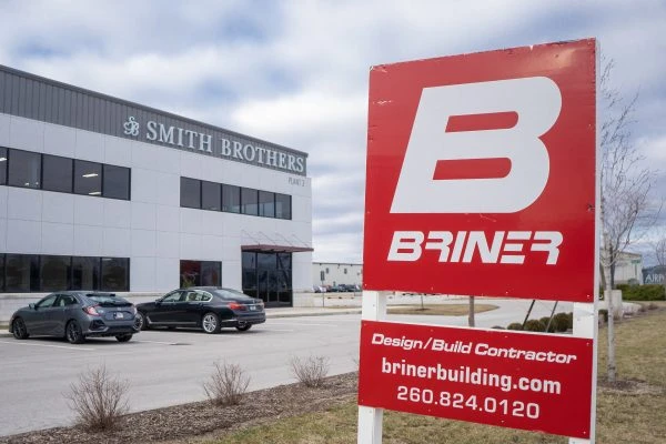 Briner Building construction sign in front of Smith Brothers building