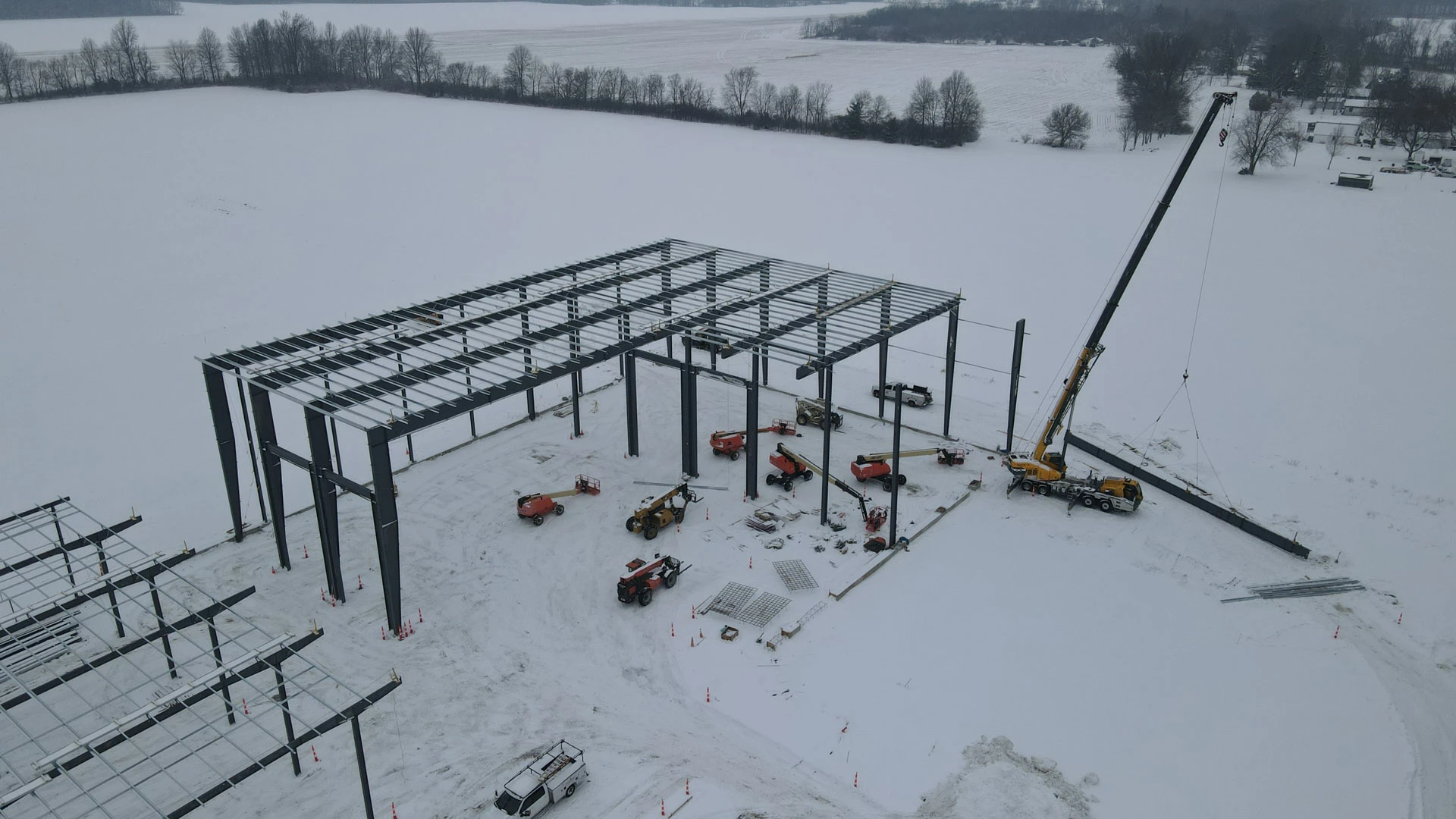 Steel frame of Almco project in the snow