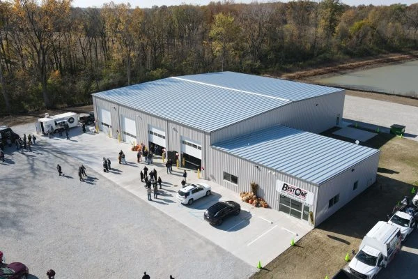 Aerial shot of completed Best Ones construction project featuring several people enjoying the open house