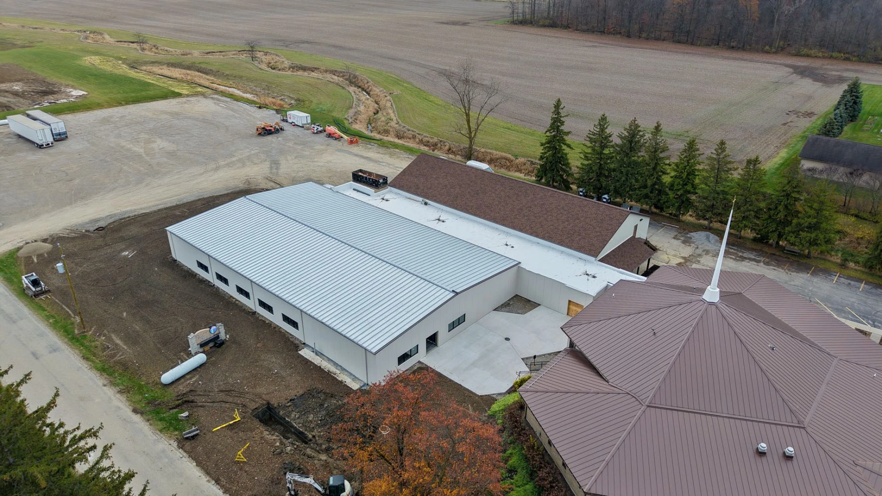 Early exterior aerial shot of Pleasant Dale Church construction site and surrounding property