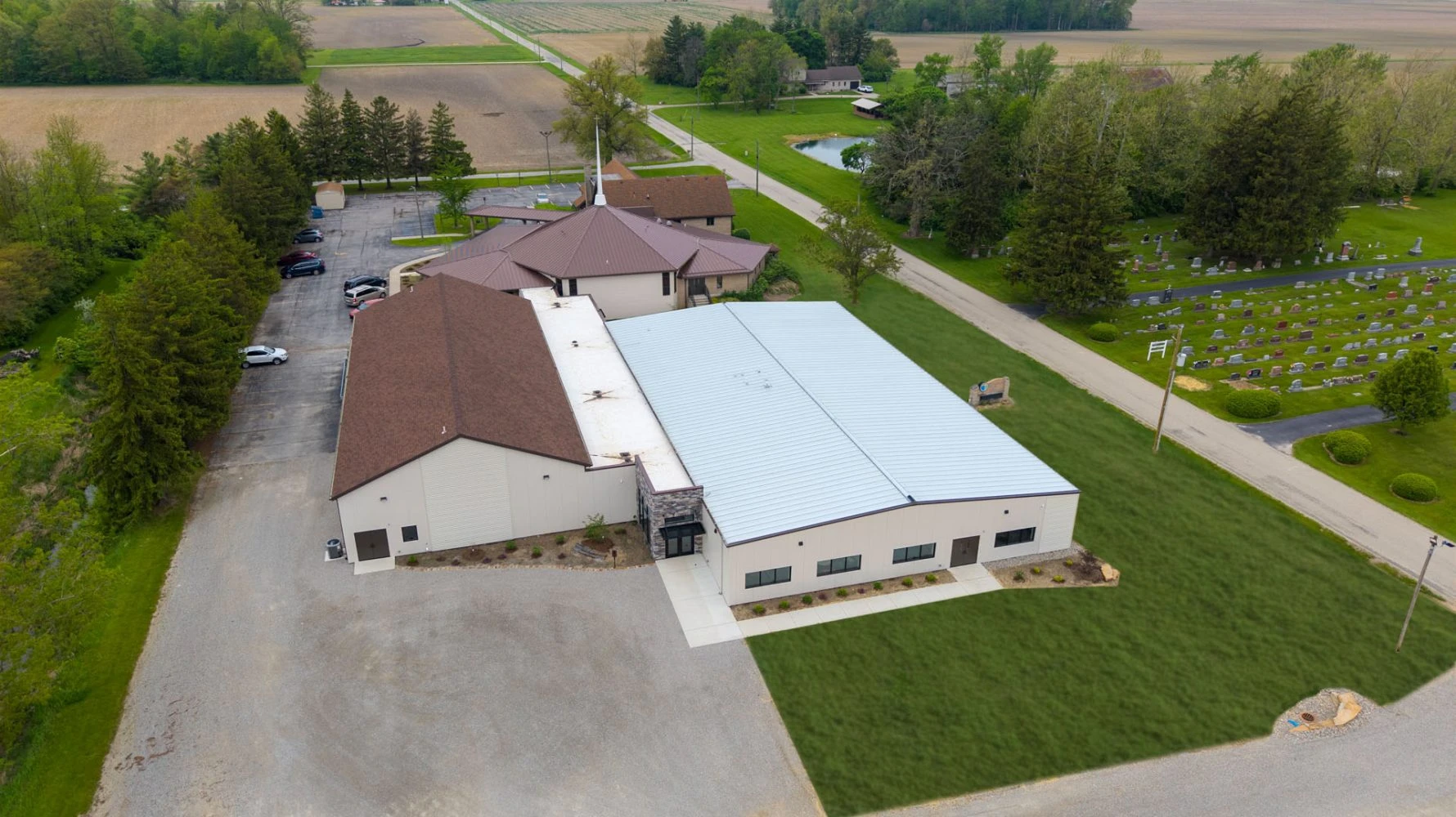 Aerial photograph of Pleasant Dale Church showing the completed exterior renovation and surrounding property.