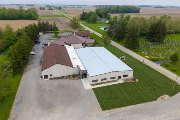 Aerial photograph of Pleasant Dale Church showing the completed exterior renovation and surrounding property.