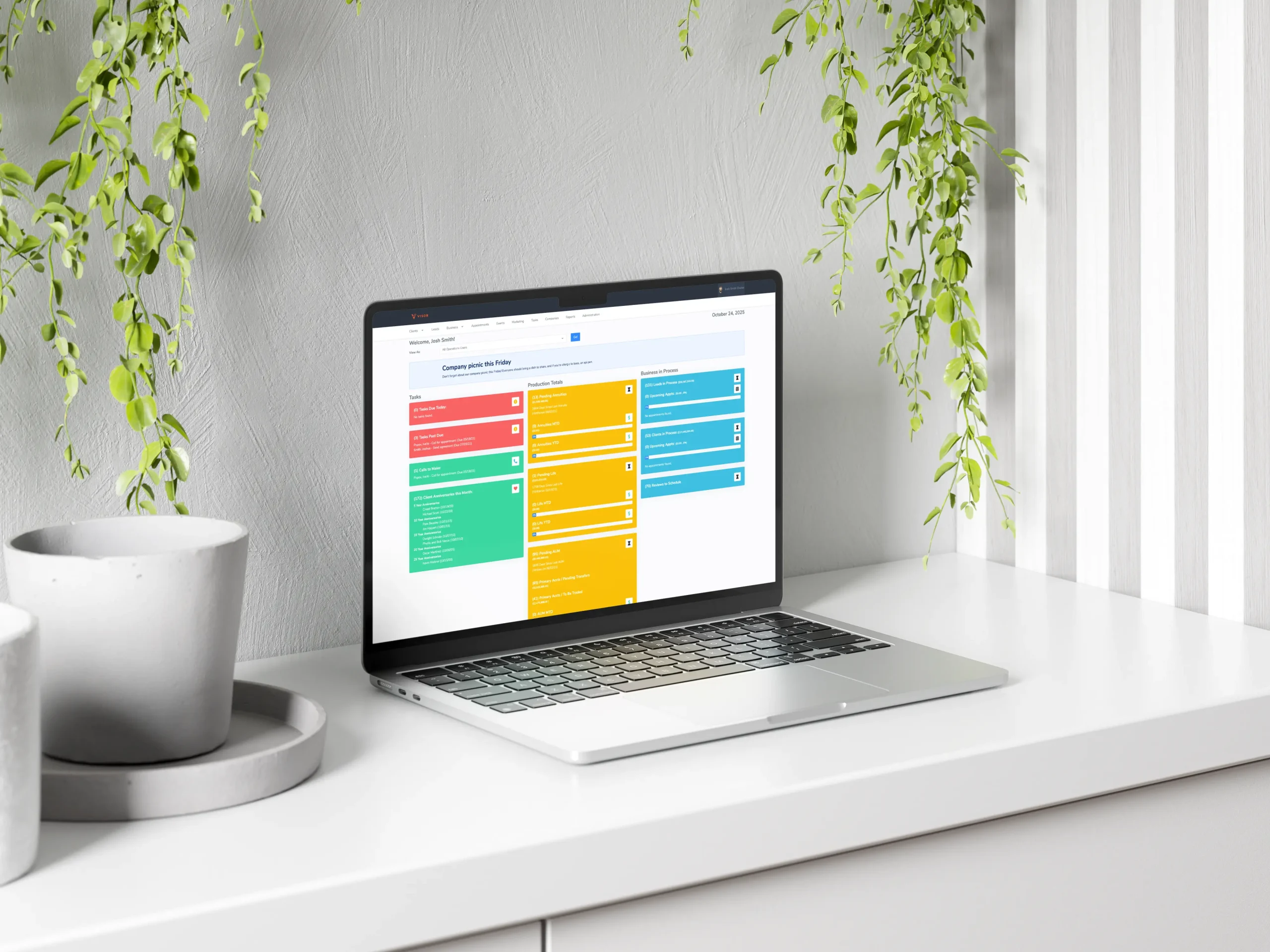 A mockup of a laptop showing the Visor CRM system designed for companies that provide financial services