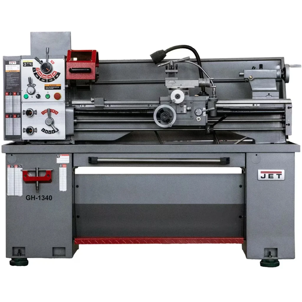 JET GH-1340 lathe, a 13 x 40 metal lathe with geared headstock, 2 inch spindle bore, and cabinet stand.