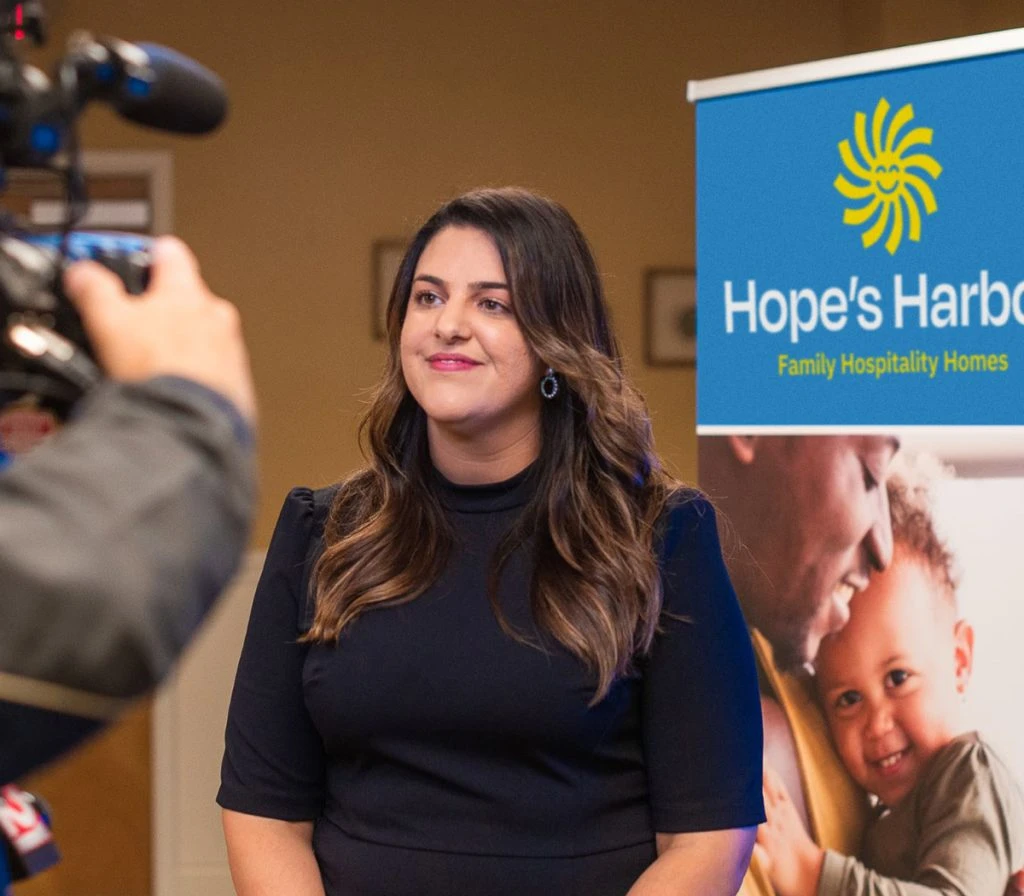 Hope's Harbor staff member being interviewed