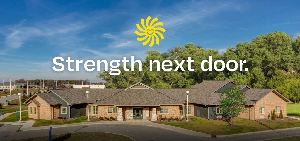 Hope's Harbor brand platform overlaid on image of building