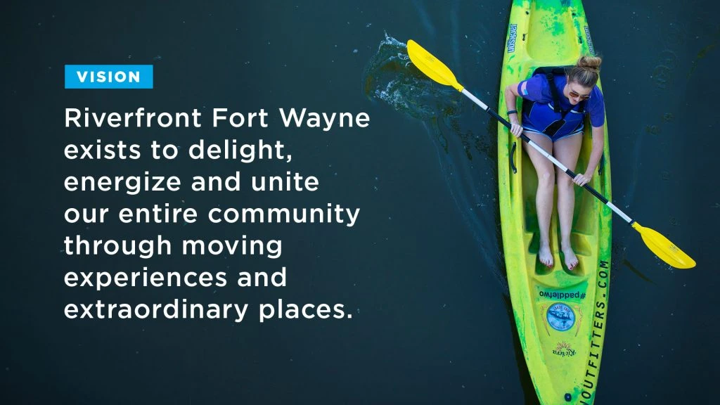Woman kayaking on Fort Wayne river with inspirational quote
