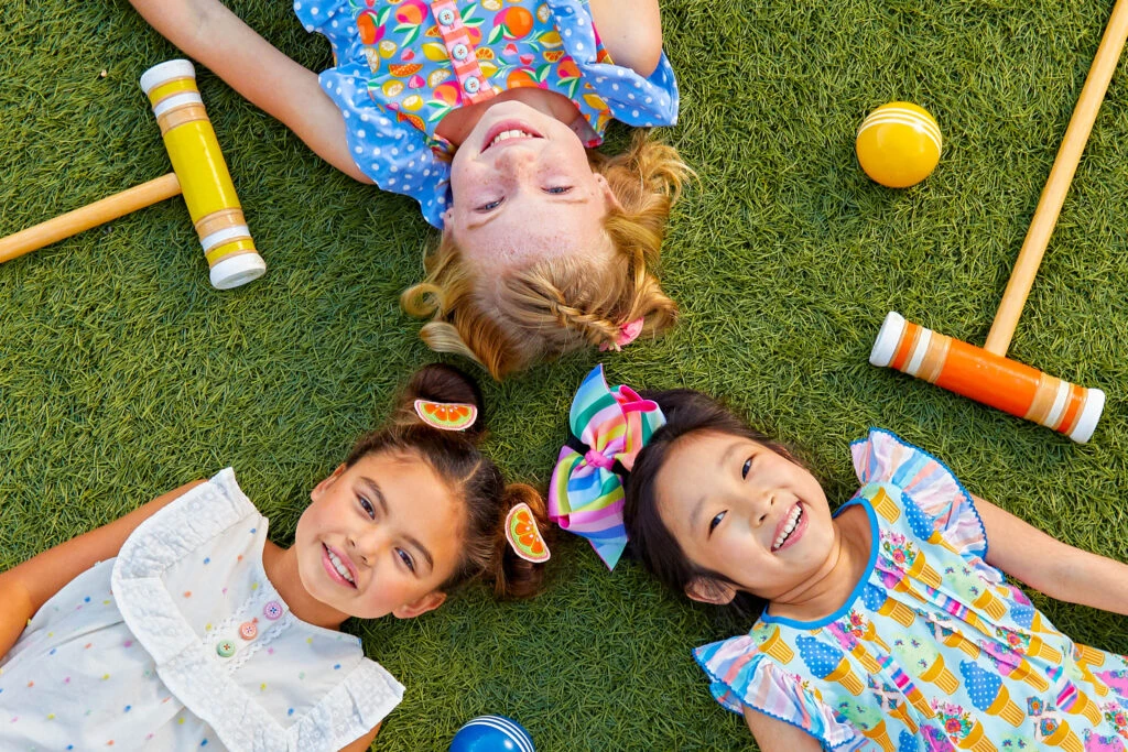 girls playing croquet wearing Matilda Jane Clothing