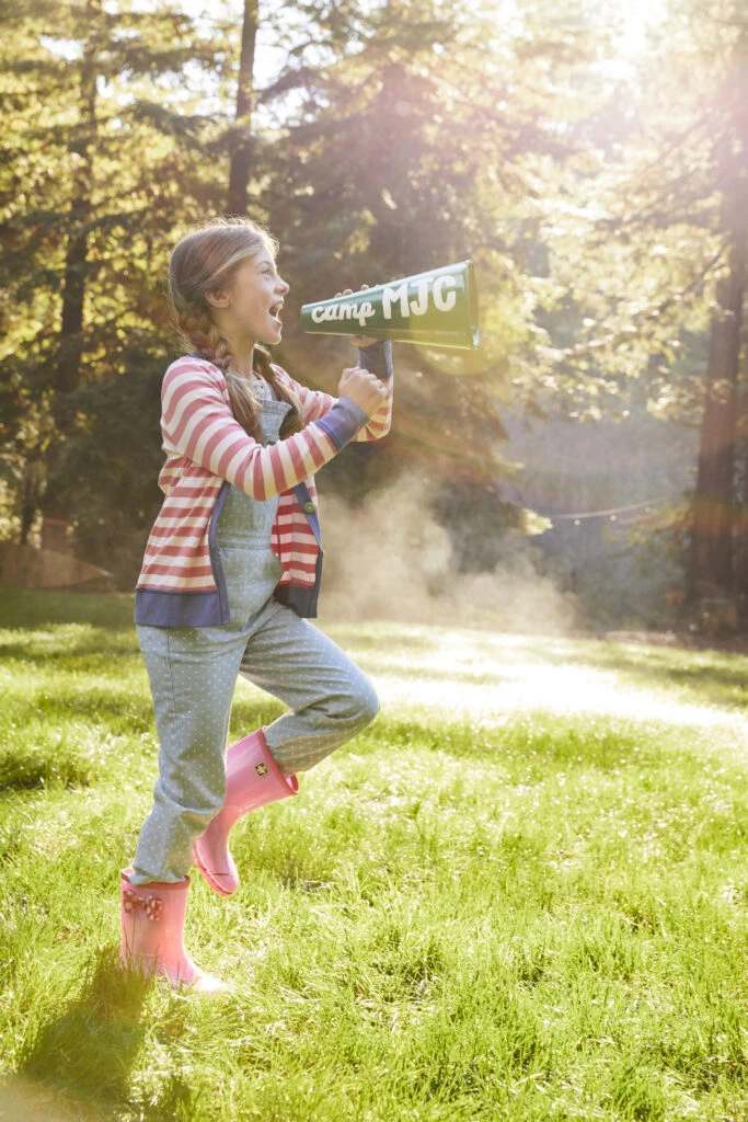 girl wearing Matilda Jane Clothing holding megaphone