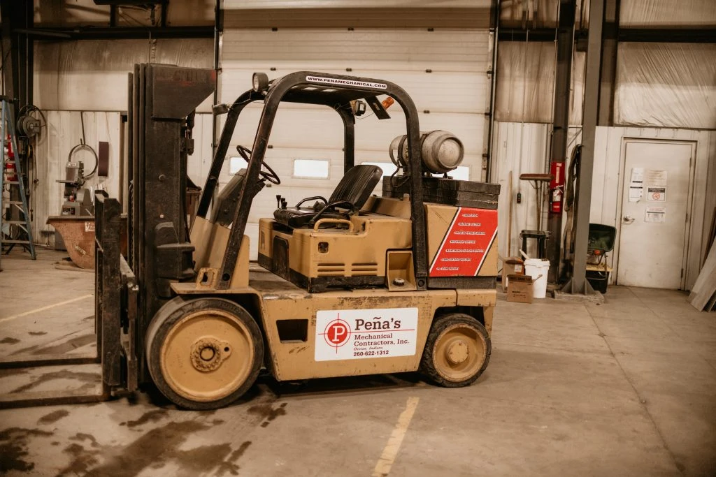 15,000# Forklift with Pena's Logo