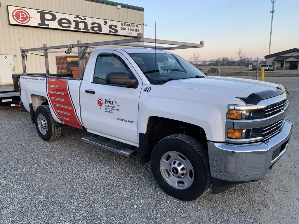 Pena's Service Truck with pipe rack