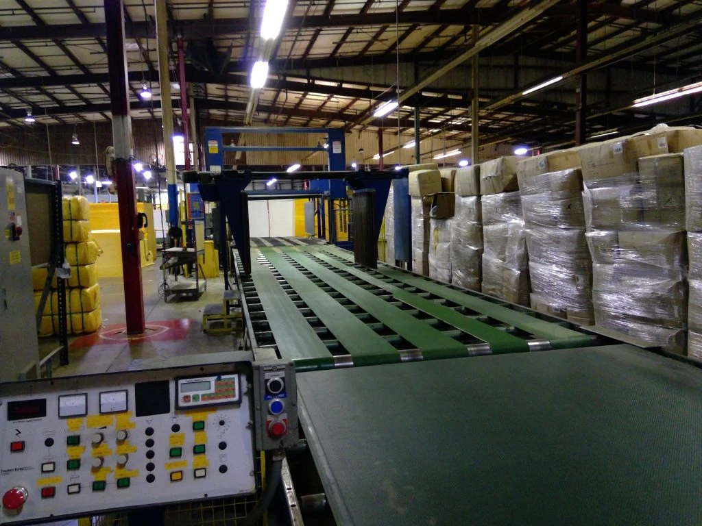 Industrial slat belt conveyor line with operator control panel