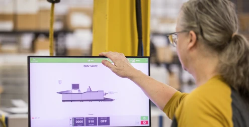 woman operating commercial printing