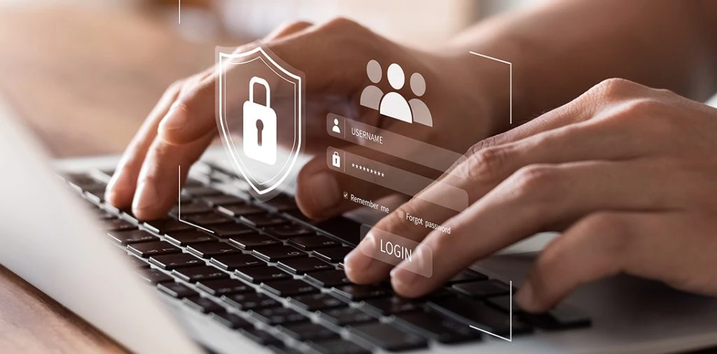 person typing on keyboard