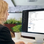 A woman generates fundraising emails using Donor Wrangler.